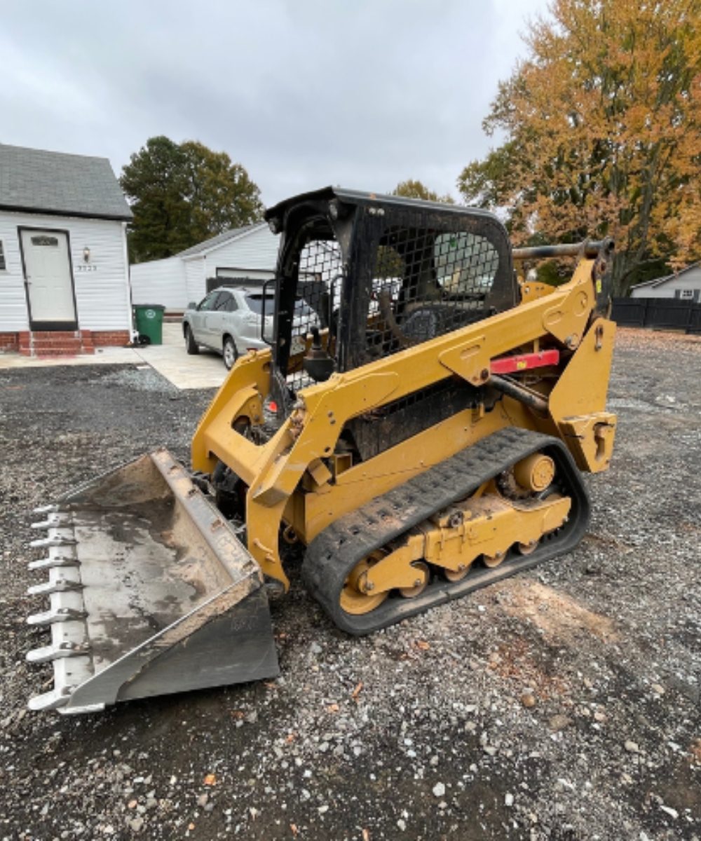 Professional skid steer sitting on a gravel lot to be used for an equipment rental Seymour TN project.